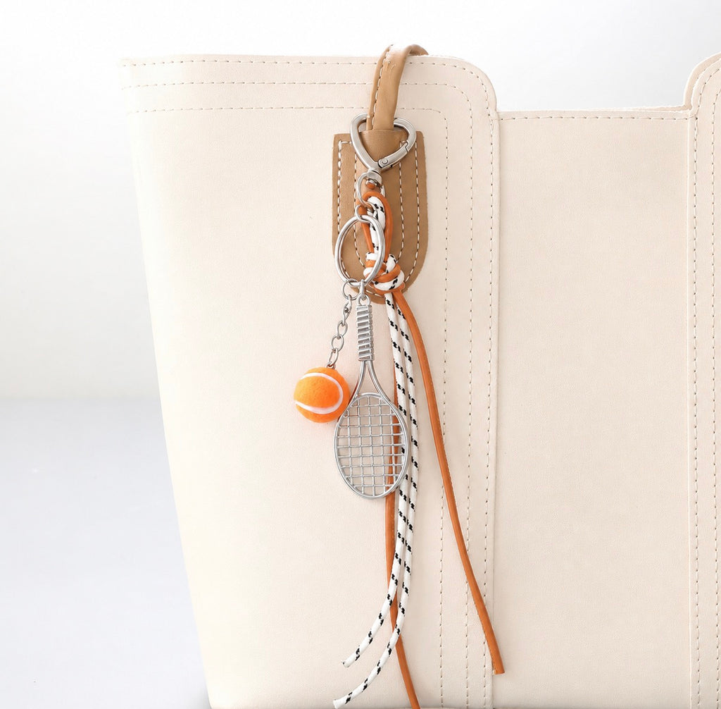 Tennis charm
